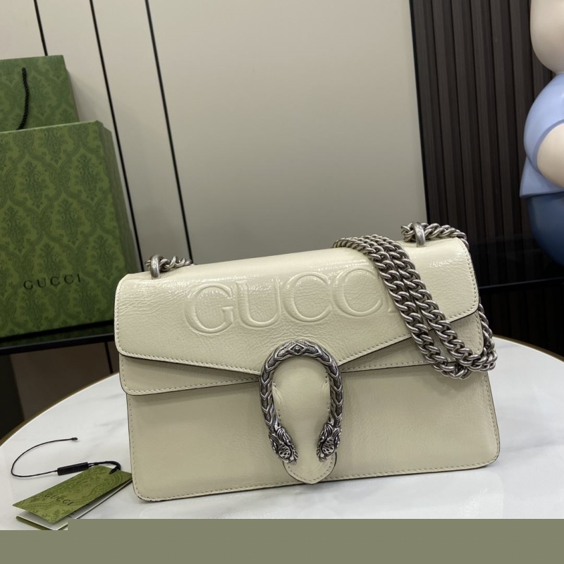 G*u*i top handle bags